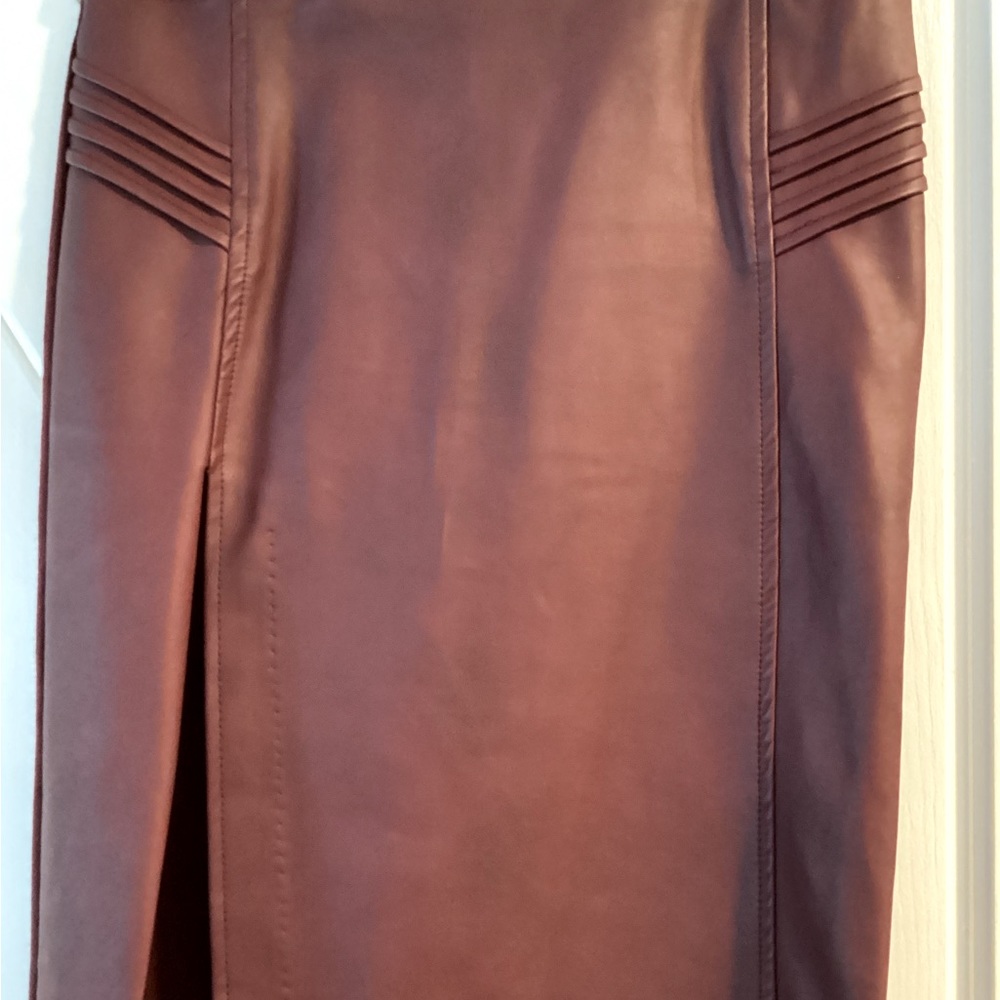 XOXO small cranberry/maroon color pleather skirt with high side slit